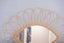 Mirror in rattan eye