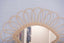 Mirror in rattan eye