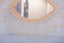 Mirror in rattan eye