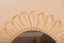 Mirror in rattan eye
