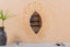 Mirror in rattan eye