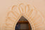 Mirror in rattan eye