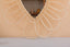 Mirror in rattan eye