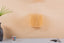 Raffia wall light fixture with lampshade