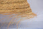 Umbrella-shaped suspension in braided natural fiber doum straw