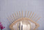 Mirror in rattan eye