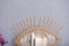 Mirror in rattan eye